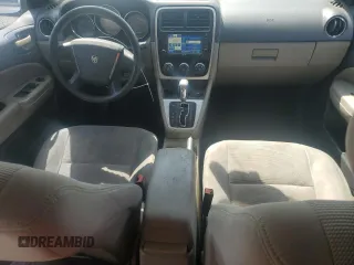 2011 Dodge Caliber Mainstreet z VIN 1B3CB3HA1BD237714, wystawiony jako Copart lot #57713635 z przebiegiem 147 998 mil mil oraz Szkody całkowita. Historia ofert i sprzedaży dostępna na DreamBid. Obrazek 8.