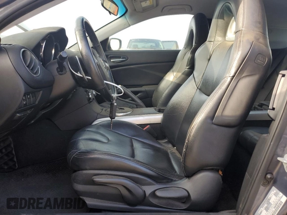 2006 Mazda RX-8 z VIN JM1FE173960204841, wystawiony jako Copart lot #85832354 z przebiegiem 129 871 mil mil oraz Czysty tytuł • Clean title. Historia ofert i sprzedaży dostępna na DreamBid. Obrazek 7.