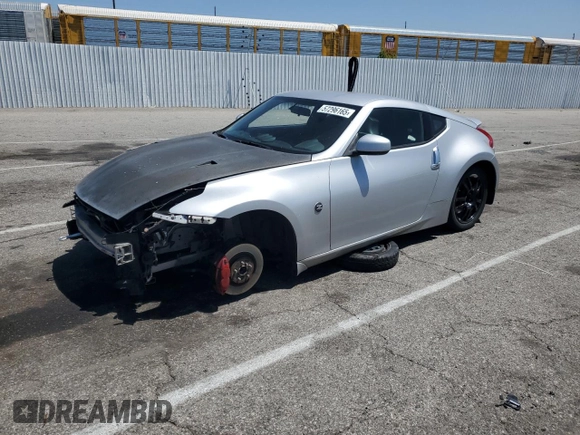 2014 Nissan 370Z Nismo with VIN JN1AZ4EH8EM633218, listed as a Copart auction lot 57296165 with Not provided miles and Salvage title. Bid and sale history available at DreamBid. Image 1.