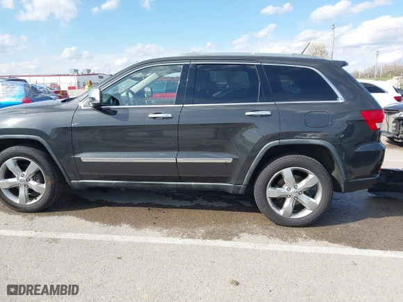 2011 Jeep Grand Cherokee Limited with VIN 1J4RR5GG4BC624876, listed as a IAAI auction lot 41877272 with 166,810 mi miles. Bid and sale history available at carsss.com. Image 14.