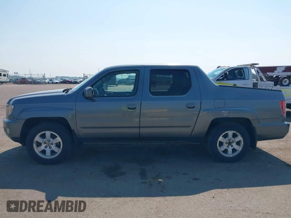 2009 Honda Ridgeline RTS z VIN 5FPYK16479B107114, wystawiony jako IAAI lot #42452199 z przebiegiem 206 853 mil mil oraz . Historia ofert i sprzedaży dostępna na DreamBid. Obrazek 14.