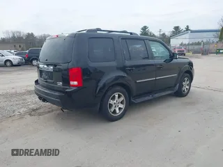 2009 Honda Pilot Touring with VIN 5FNYF48969B055806, listed as a IAAI auction lot 42138651 with 253,623 mi miles and . Bid and sale history available at carsss.com. Image 4.