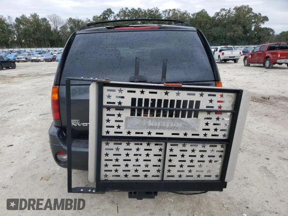 2006 GMC Envoy SLE with VIN 1GKDS13S562135135, listed as a Copart auction lot 88353995 with 159,251 mi miles and Salvage Title. Bid and sale history available at carsss.com. Image 6.