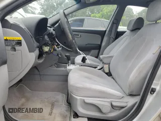 2007 Hyundai Elantra GLS z VIN KMHDU46D77U229572, wystawiony jako Copart lot #56008515 z przebiegiem 75 374 mil mil oraz Szkoda całkowita • Salvage title. Historia ofert i sprzedaży dostępna na DreamBid. Obrazek 7.