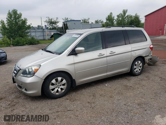2007 Honda Odyssey EX with VIN 5FNRL38427B513477, listed as a Copart auction lot 62457695 with 216,977 mi miles and Salvage title. Bid and sale history available at DreamBid. Image 1.
