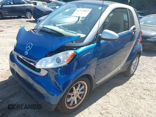 2009 Smart fortwo Pure with VIN WMEEJ31X79K210162, listed as a IAAI auction lot 42715203 with 95,089 mi miles and . Bid and sale history available at DreamBid. Image 2.