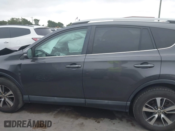 2018 Toyota RAV4 XLE with VIN 2T3WFREV1JW512476, listed as a IAAI auction lot 42177733 with 132,207 mi miles and . Bid and sale history available at DreamBid. Image 14.