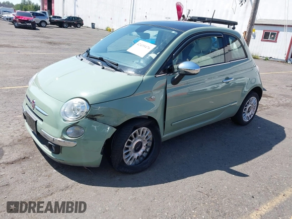 2013 FIAT 500 Lounge with VIN 3C3CFFCR5DT739516, listed as a IAAI auction lot 42439476 with 62,919 mi miles and . Bid and sale history available at DreamBid. Image 2.