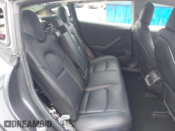 2018 Tesla Model 3 Long Range Battery with VIN 5YJ3E1EA8JF059385, listed as a IAAI auction lot 42116589 with 63,630 mi miles and . Bid and sale history available at DreamBid. Image 8.
