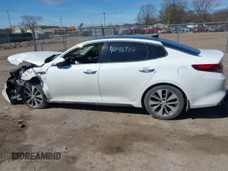 2018 Kia Optima S z VIN 5XXGT4L31JG256876, wystawiony jako IAAI lot #42046732 z przebiegiem 115 746 mil mil oraz . Historia ofert i sprzedaży dostępna na DreamBid. Obrazek 13.