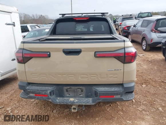 2023 Hyundai Santa Cruz SEL Premium z VIN 5NTJDDAF7PH046605, wystawiony jako IAAI lot #41488316 z przebiegiem 68 562 mil mil oraz . Historia ofert i sprzedaży dostępna na DreamBid. Obrazek 16.