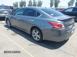 2015 Nissan Altima SV z VIN 1N4AL3AP1FC261692, wystawiony jako IAAI lot #42378146 z przebiegiem 215 563 mil mil oraz . Historia ofert i sprzedaży dostępna na DreamBid. Obrazek 3.