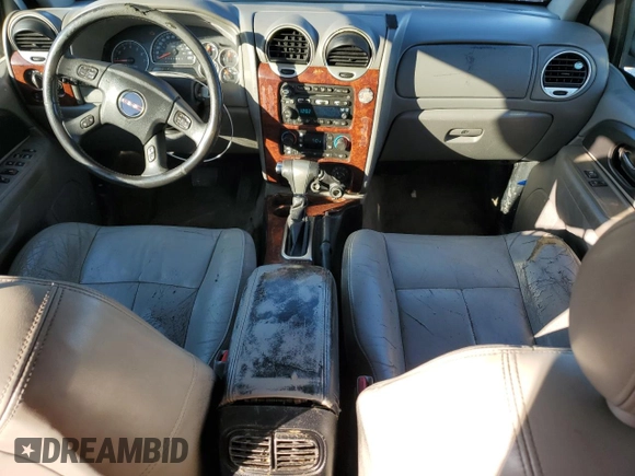 2008 GMC Envoy SLE2 with VIN 1GKDT13S882100069, listed as a Copart auction lot 77164634 with 206,709 mi miles and Salvage Title. Bid and sale history available at DreamBid. Image 8.
