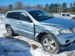 2013 Jeep Grand Cherokee Overland with VIN 1C4RJFCTXDC541770, listed as a IAAI auction lot 41610600 with 164,065 mi miles. Bid and sale history available at carsss.com. Image 6.