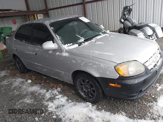 2005 Hyundai Accent GLS with VIN KMHCG45C75U656548, listed as a IAAI auction lot 41553603 with 178,070 mi miles. Bid and sale history available at carsss.com. Image 1.
