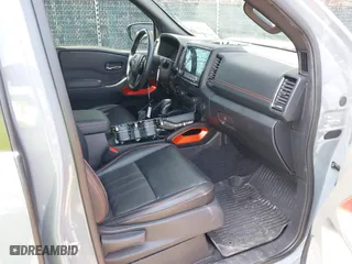 2023 Nissan Frontier PRO-4X with VIN 1N6ED1EKXPN674662, listed as a IAAI auction lot 42001624 with 24,928 mi miles. Bid and sale history available at carsss.com. Image 5.
