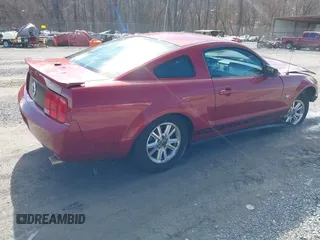 2009 Ford Mustang with VIN 1ZVHT80N695136392, listed as a IAAI auction lot 41509619 with 141,563 mi miles and . Bid and sale history available at carsss.com. Image 4.