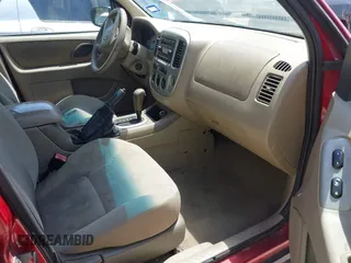 2005 Ford Escape XLT with VIN 1FMYU031X5KE17077, listed as a IAAI auction lot 42260075 with 234,758 mi miles and . Bid and sale history available at DreamBid. Image 5.