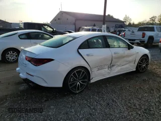 2022 Mercedes-Benz CLA 35 AMG with VIN W1K5J5BBXNN319209, listed as a Copart auction lot 69269304 with 23,458 mi miles and Salvage Title. Bid and sale history available at DreamBid. Image 3.