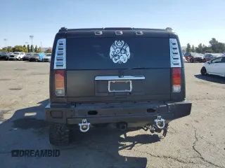 2003 Hummer H2 with VIN 5GRGN23U83H134284, listed as a Copart auction lot 70259154 with 0 mi miles and Salvage Title. Bid and sale history available at carsss.com. Image 6.