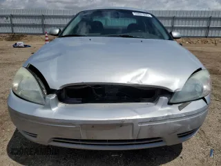2007 Ford Taurus SEL z VIN 1FAFP56UX7A156005, wystawiony jako Copart lot #54691695 z przebiegiem 152 197 mil mil oraz Szkoda całkowita • Salvage title. Historia ofert i sprzedaży dostępna na DreamBid. Obrazek 5.