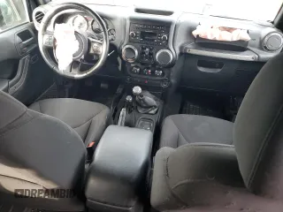 2018 Jeep Wrangler JK Unlimited Sport with VIN 1C4BJWDG0JL834219, listed as a Copart auction lot 87192904 with 77,452 mi miles and Salvage Title. Bid and sale history available at carsss.com. Image 8.