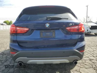 2018 BMW X1 sDrive28i with VIN WBXHU7C30J5H42351, listed as a Copart auction lot 49173875 with 139,084 mi miles and Clean Title. Bid and sale history available at carsss.com. Image 6.