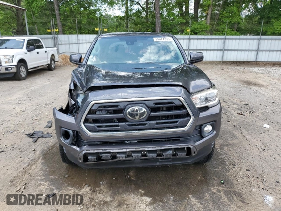 2018 Toyota Tacoma SR5 с VIN 5TFAZ5CN3JX071474, выставлен на аукционе Copart как лот 54677335 с пробегом 86 866 миль миль и Списание • Salvage title. История ставок и продаж доступна на DreamBid. Изображение 5.
