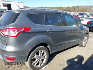 2014 Ford Escape Titanium with VIN 1FMCU9J94EUC50534, listed as a IAAI auction lot 41040341 with 115,502 mi miles. Bid and sale history available at carsss.com. Image 12.