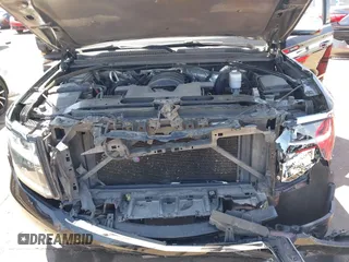 2015 Chevrolet Tahoe LTZ z VIN 1GNSKCKC7FR715512, wystawiony jako IAAI lot #42054583 z przebiegiem 106 941 mil mil oraz . Historia ofert i sprzedaży dostępna na DreamBid. Obrazek 10.