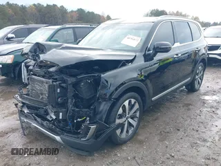 2021 Kia Telluride S with VIN 5XYP64HC0MG139788, listed as a IAAI auction lot 40784872 with 103,934 mi miles and . Bid and sale history available at DreamBid. Image 2.