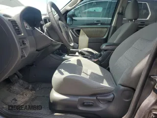 2006 Ford Escape XLT z VIN 1FMCU03186KA78489, wystawiony jako Copart lot #55412325 z przebiegiem 144 243 mil mil oraz Szkoda całkowita • Salvage title. Historia ofert i sprzedaży dostępna na DreamBid. Obrazek 7.