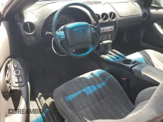 2000 Pontiac Firebird Firebird z VIN 2G2FS22K5Y2116047, wystawiony jako Copart lot #58234695 z przebiegiem 155 876 mil mil oraz Tytuł czysty. Historia ofert i sprzedaży dostępna na DreamBid. Obrazek 8.