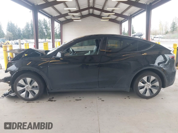 2023 Tesla Model Y Long Range with VIN 7SAYGDEE0PF909610, listed as a IAAI auction lot 41906081 with 20,656 mi miles and . Bid and sale history available at DreamBid. Image 15.