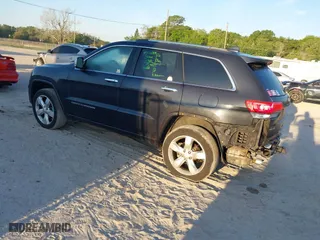 2014 Jeep Grand Cherokee Overland with VIN 1C4RJFCG0EC206358, listed as a IAAI auction lot 41893508 with 120,327 mi miles. Bid and sale history available at carsss.com. Image 3.