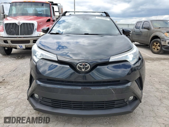2018 Toyota C-HR XLE with VIN NMTKHMBX8JR001705, listed as a Copart auction lot 57764705 with 92,847 mi miles and Salvage title. Bid and sale history available at DreamBid. Image 5.