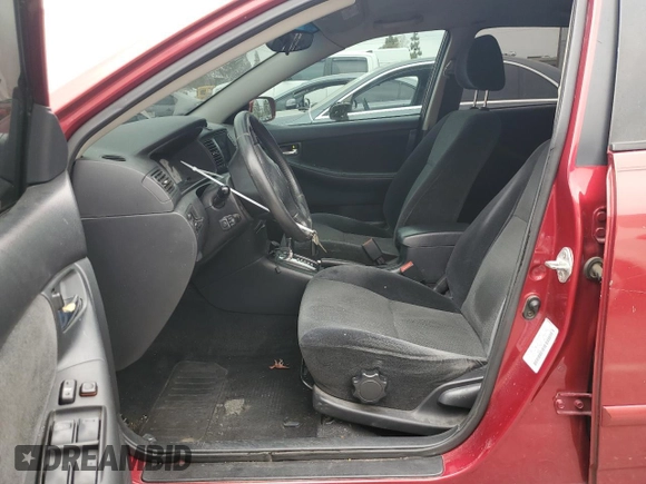 2003 Toyota Corolla CE with VIN 1NXBR32E63Z118863, listed as a Copart auction lot 54616565 with 233,229 mi miles and Salvage Title. Bid and sale history available at DreamBid. Image 7.