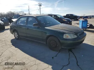 1999 Honda Civic LX with VIN 2HGEJ6676XH573762, listed as a Copart auction lot 44687825 with 272,852 mi miles and Salvage Title. Bid and sale history available at DreamBid. Image 4.