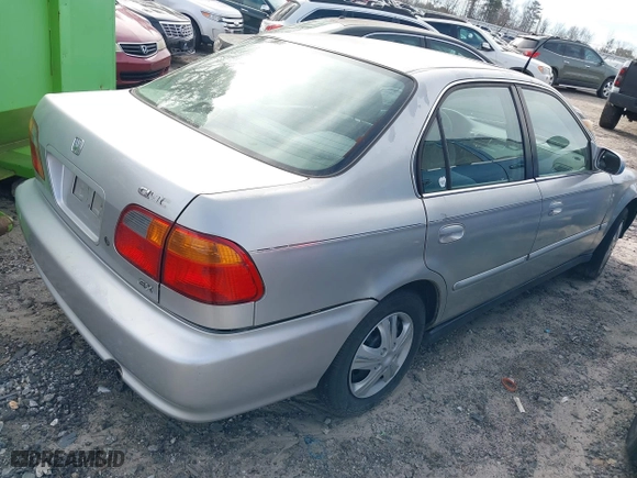1999 Honda Civic EX with VIN 2HGEJ8649XH590637, listed as a IAAI auction lot 41584579 with 184,999 mi miles. Bid and sale history available at carsss.com. Image 4.