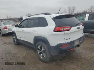 2015 Jeep Cherokee Trailhawk z VIN 1C4PJMBS9FW698857, wystawiony jako Copart lot #86572504 z przebiegiem 143 919 mil mil oraz Czysty tytuł • Clean title. Historia ofert i sprzedaży dostępna na DreamBid. Obrazek 2.