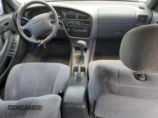1995 Toyota Camry LE with VIN 4T1SK12E4SU878765, listed as a Copart auction lot 57761385 with 181,674 mi miles and Clean title. Bid and sale history available at DreamBid. Image 8.