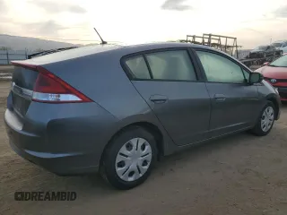 2012 Honda Insight z VIN JHMZE2H32CS000284, wystawiony jako Copart lot #50160335 z przebiegiem 64 074 mil mil oraz Szkoda całkowita • Salvage title. Historia ofert i sprzedaży dostępna na DreamBid. Obrazek 3.