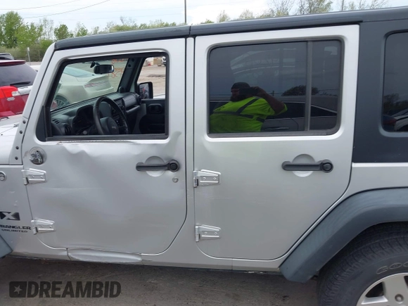 2008 Jeep Wrangler Unlimited X with VIN 1J4GA39108L510829, listed as a IAAI auction lot 42069589 with 108,696 mi miles and . Bid and sale history available at DreamBid. Image 15.