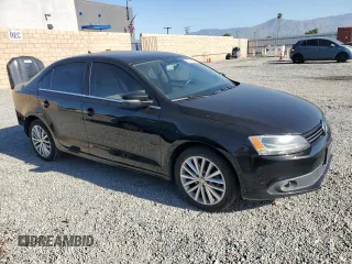 2012 Volkswagen Jetta SEL с VIN 3VWLP7AJ5CM411787, выставлен на аукционе Copart как лот 55701875 с пробегом 194 969 миль миль и Списание • Salvage title. История ставок и продаж доступна на DreamBid. Изображение 4.