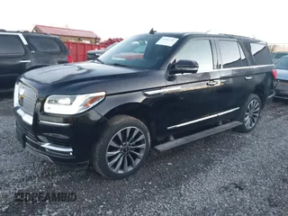 2018 Lincoln Navigator Select z VIN 5LMJJ2JT9JEL05516, wystawiony jako IAAI lot #41801291 z przebiegiem 100 487 mil mil oraz . Historia ofert i sprzedaży dostępna na DreamBid. Obrazek 2.
