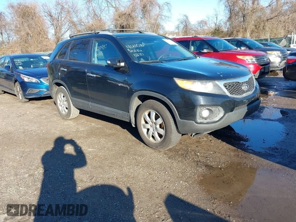 2012 Kia Sorento LX with VIN 5XYKT4A67CG231633, listed as a IAAI auction lot 41210382 with 217,055 mi miles. Bid and sale history available at carsss.com. Image 1.