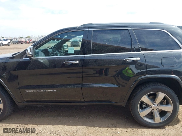 2014 Jeep Grand Cherokee Overland with VIN 1C4RJFCG4EC273786, listed as a IAAI auction lot 41901304 with 73,055 mi miles. Bid and sale history available at carsss.com. Image 14.