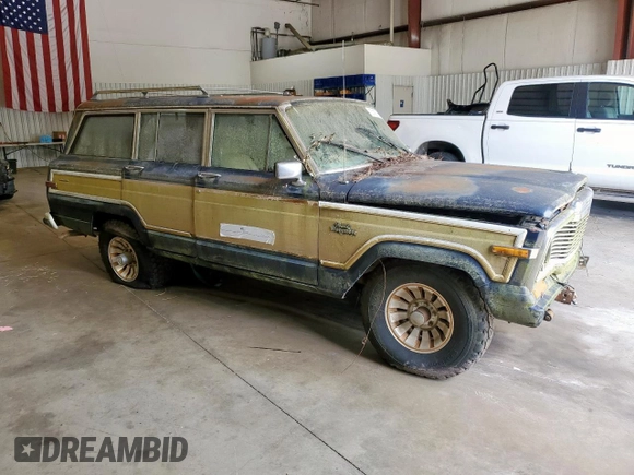 1986 Jeep Grand Wagoneer с VIN 1JCNJ15U5GT147524, выставлен на аукционе Copart как лот 57421255 с пробегом 112 292 миль миль и Списание • Salvage title. История ставок и продаж доступна на DreamBid. Изображение 4.