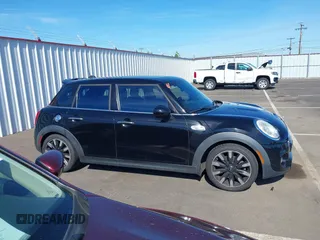 2015 MINI Hardtop 4 Door S z VIN WMWXU3C58F2B57218, wystawiony jako IAAI lot #42361437 z przebiegiem 96 984 mil mil oraz . Historia ofert i sprzedaży dostępna na DreamBid. Obrazek 13.