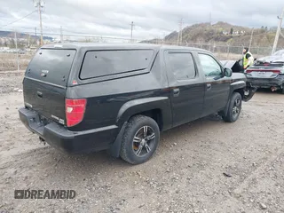 2011 Honda Ridgeline RT z VIN 5FPYK1F24BB010604, wystawiony jako IAAI lot #41941553 z przebiegiem 37 814 mil mil oraz . Historia ofert i sprzedaży dostępna na DreamBid. Obrazek 4.